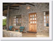 11VirungaLodge - 12 * The front porch of our room, Bunyonyi.